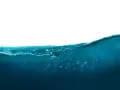Vague d'eau bleue avec des bulles, rappelant la masse volumique de l'eau.